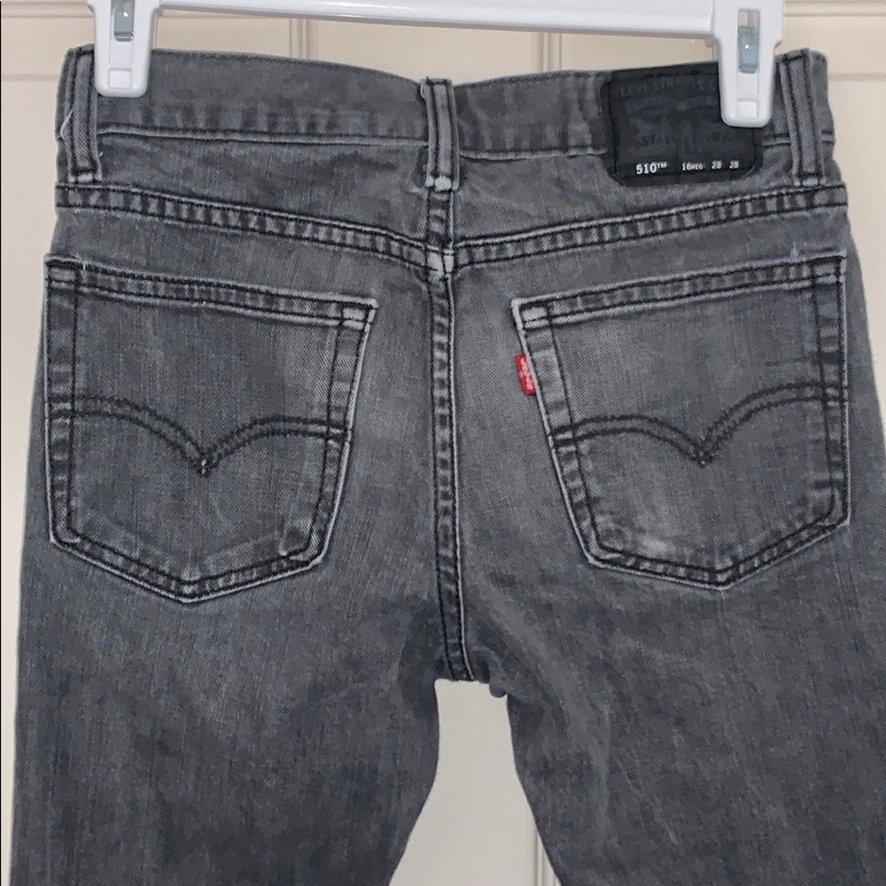 Grey mid rise Levi jeans